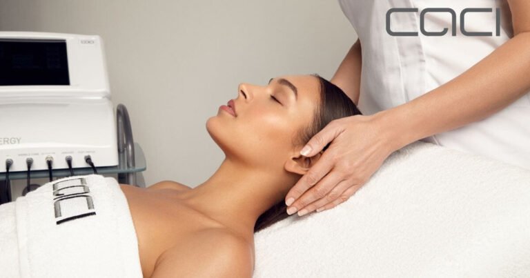 Beautiful lady laying down having a CACI facial with the CACI Synergy machine in the background